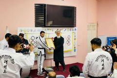 AANTA-Member-Receiving-Dan-certificate-from-Head-of-Olympic-Affairs-2