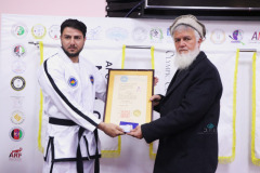 AANTA-Member-Receiving-Dan-certificate-from-Head-of-Olympic-Affairs-3