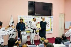 AANTA-Member-Receiving-Dan-certificate-from-Head-of-Olympic-Affairs