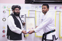 AANTA-Vice-President-and-IMGC-Afghanistan-President-Mr.-Sayed-Rohullah-Hussaini-receiving-his-Dan-Certificate-from-Head-of-Afghanistan-Olympic1